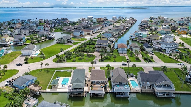 1114 Tiki Dr, Galveston, TX 77554 - aerial view of residential area with a large body of water
