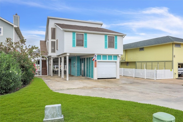 1114 Tiki Dr, Galveston, TX 77554 - view of front of property featuring a garage, concrete driveway, a carport, a shingled roof, and stairs