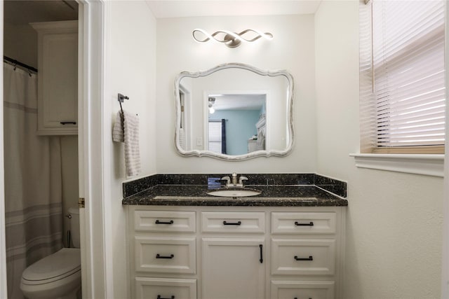 1114 Tiki Dr, Galveston, TX 77554 - full bathroom featuring vanity and a shower with curtain