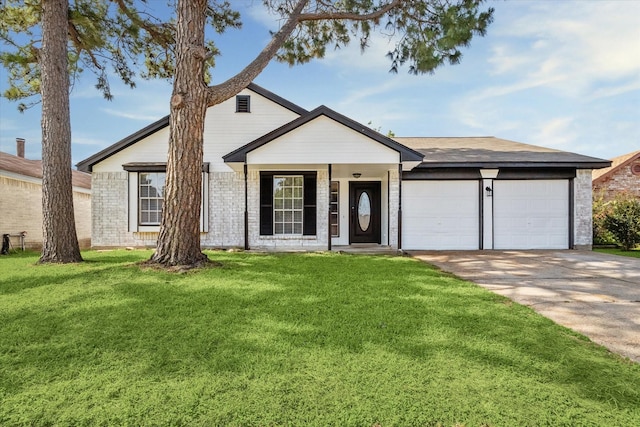 16739 Sky Blue Ln, Houston, TX 77095 - view of front of house featuring an attached garage, a front yard, driveway, and brick siding
