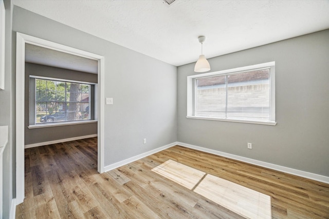 16739 Sky Blue Ln, Houston, TX 77095 - empty room with wood finished floors and baseboards