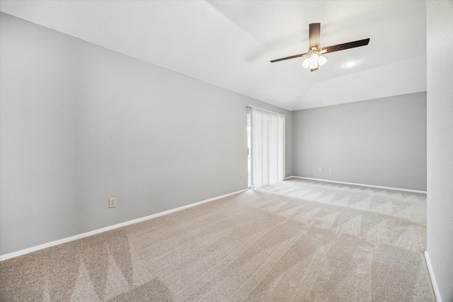16739 Sky Blue Ln, Houston, TX 77095 - empty room with carpet floors, ceiling fan, baseboards, and vaulted ceiling