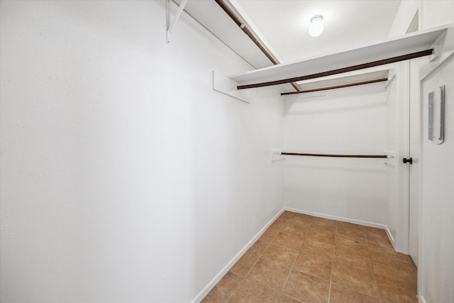 16739 Sky Blue Ln, Houston, TX 77095 - spacious closet with light tile patterned floors