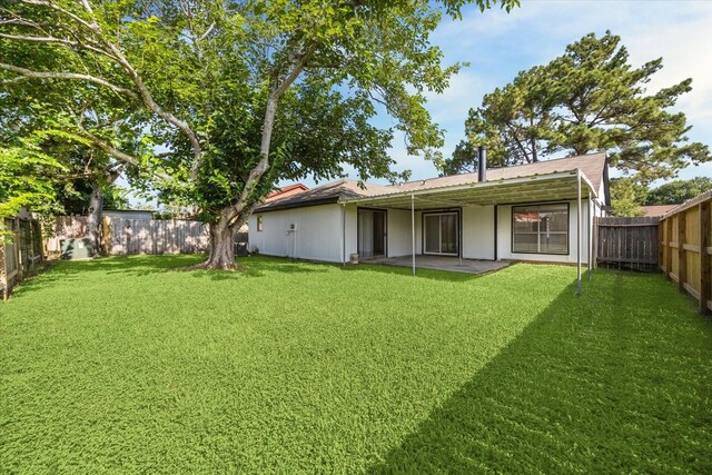16739 Sky Blue Ln, Houston, TX 77095 - back of property featuring a patio area