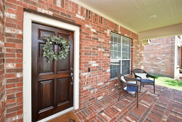 711 Shenandoah Falls Ln, Rosenberg, TX 77469 - entrance to property featuring brick siding and covered porch