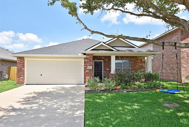 711 Shenandoah Falls Ln, Rosenberg, TX 77469 - view of front of property with a garage, a front lawn, driveway, and brick siding