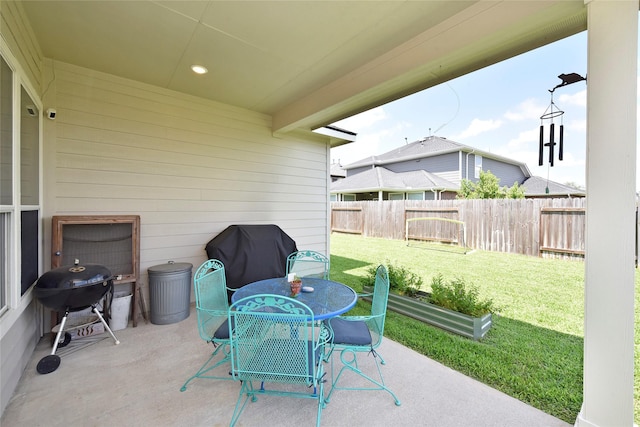 711 Shenandoah Falls Ln, Rosenberg, TX 77469 - view of patio featuring a grill and outdoor dining space