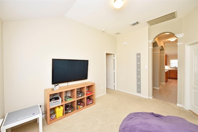 711 Shenandoah Falls Ln, Rosenberg, TX 77469 - bedroom with arched walkways, decorative columns, carpet floors, lofted ceiling, and baseboards