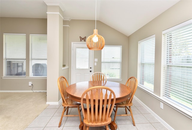 711 Shenandoah Falls Ln, Rosenberg, TX 77469 - dining room with lofted ceiling, baseboards, light carpet, and light tile patterned flooring