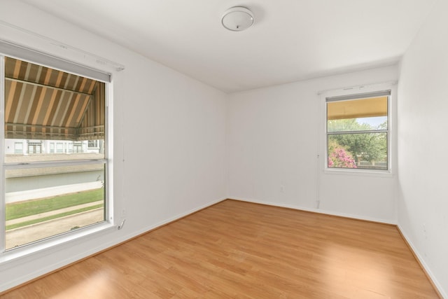 3131 Cummins St Unit 50, Houston, TX 77027 - empty room with wood finished floors and baseboards