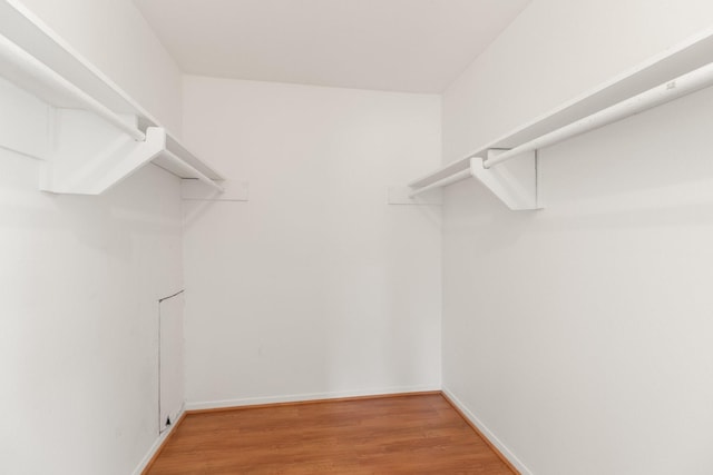 3131 Cummins St Unit 50, Houston, TX 77027 - spacious closet featuring light wood-type flooring