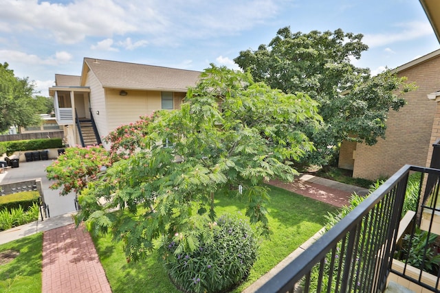 3131 Cummins St Unit 50, Houston, TX 77027 - view of side of property with stairway and a balcony