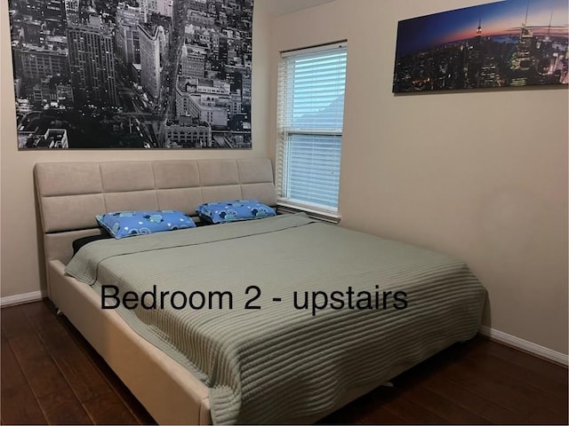 5734 Cedar Field Way, Houston, TX 77084 - bedroom featuring hardwood / wood-style flooring and a view of city