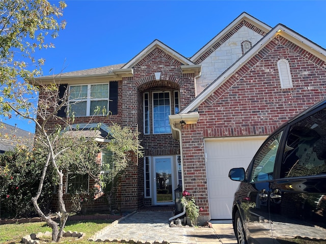 5734 Cedar Field Way, Houston, TX 77084 - view of front of property featuring a garage and brick siding