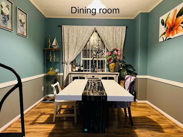5734 Cedar Field Way, Houston, TX 77084 - dining space featuring wood finished floors and ornamental molding