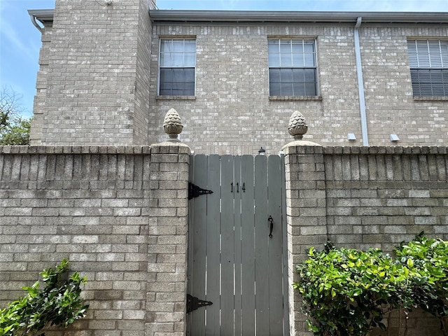 6500 Sands Point Dr Unit 114, Houston, TX 77074 - rear view of property with a chimney