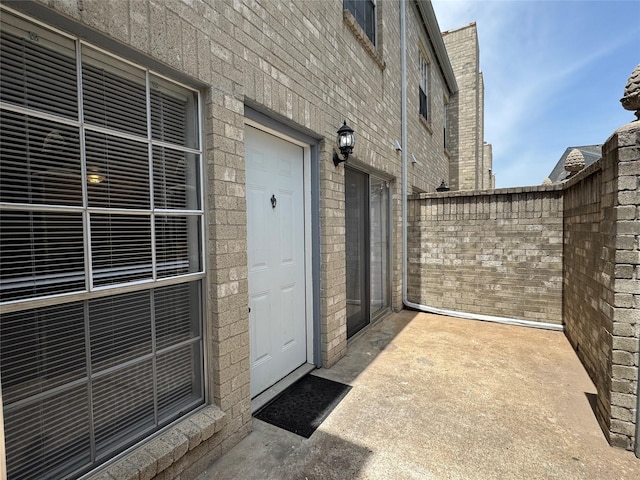 6500 Sands Point Dr Unit 114, Houston, TX 77074 - view of exterior entry featuring brick siding