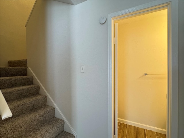 6500 Sands Point Dr Unit 114, Houston, TX 77074 - stairway featuring baseboards and wood finished floors