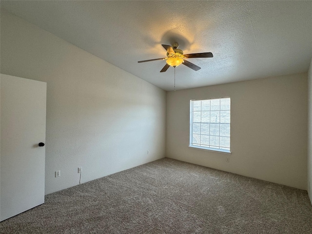 6500 Sands Point Dr Unit 114, Houston, TX 77074 - empty room with carpet floors, ceiling fan, and a textured ceiling