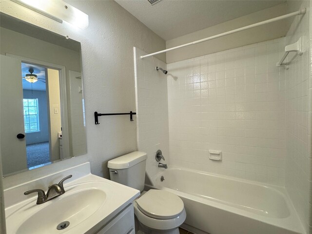 6500 Sands Point Dr Unit 114, Houston, TX 77074 - bathroom with  shower combination, toilet, vanity, and a textured wall