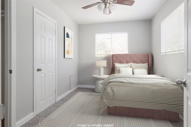 4514 Keystone St, Houston, TX 77021 - bedroom featuring carpet flooring, baseboards, and a ceiling fan