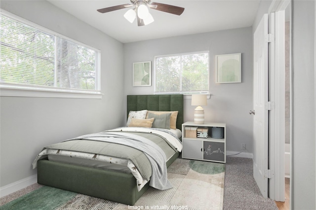 4514 Keystone St, Houston, TX 77021 - bedroom with baseboards, carpet flooring, and a ceiling fan