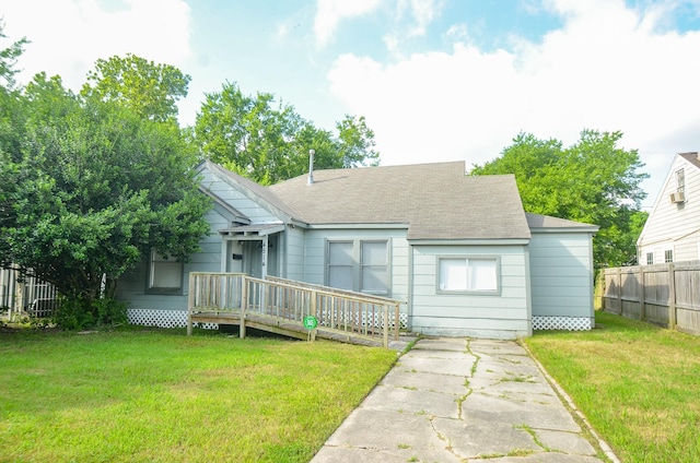 4514 Keystone St, Houston, TX 77021 - view of front of property with a deck and a shingled roof