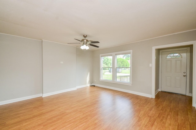 4514 Keystone St, Houston, TX 77021 - unfurnished room with light wood-style flooring, a ceiling fan, baseboards, and ornamental molding