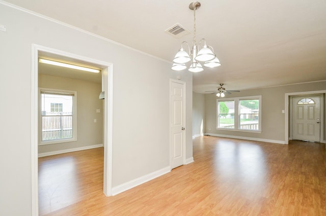 4514 Keystone St, Houston, TX 77021 - unfurnished room featuring a chandelier, light wood-type flooring, baseboards, a ceiling fan, and crown molding
