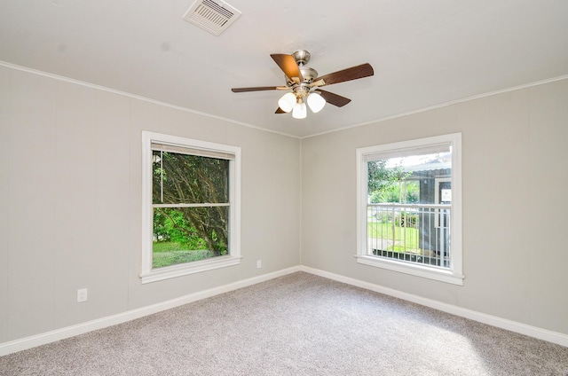 4514 Keystone St, Houston, TX 77021 - carpeted empty room with a ceiling fan, ornamental molding, and baseboards