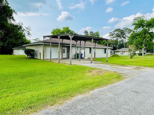 105 Cornelia St, Sweeny, TX 77480 - ranch-style house with driveway, an outbuilding, and a front lawn