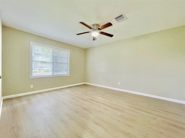 105 Cornelia St, Sweeny, TX 77480 - spare room featuring ceiling fan, wood finished floors, and baseboards
