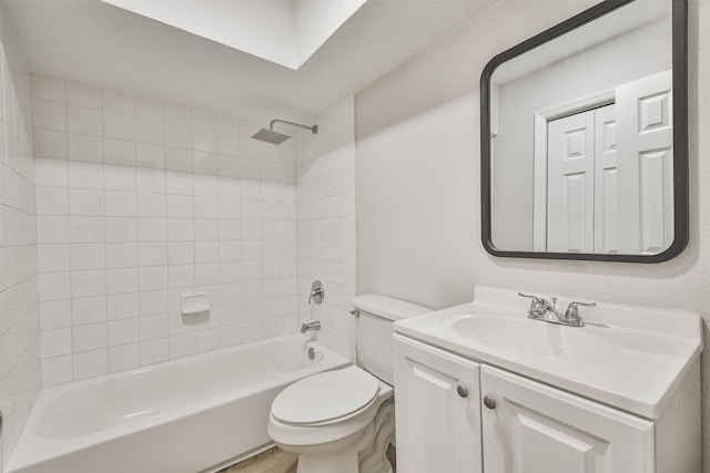 12523 Drifting Winds Dr, Houston, TX 77044 - bathroom featuring toilet, vanity, and bathing tub / shower combination