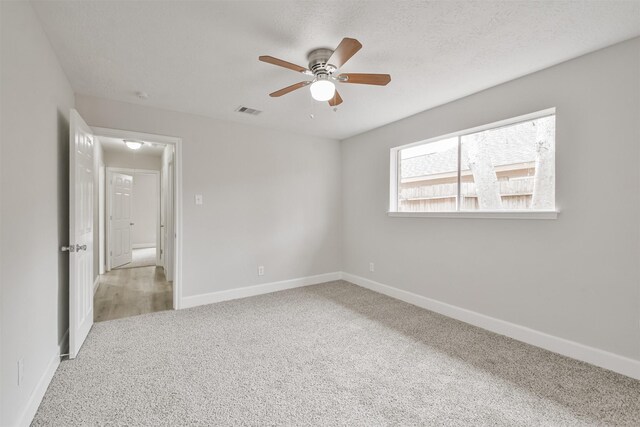 12523 Drifting Winds Dr, Houston, TX 77044 - carpeted empty room featuring ceiling fan and baseboards