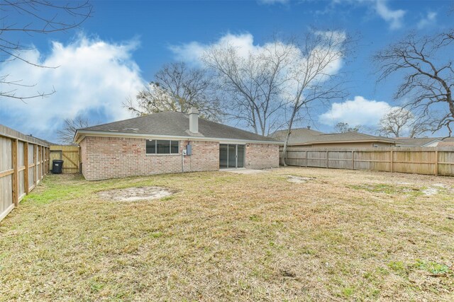 12523 Drifting Winds Dr, Houston, TX 77044 - back of house with brick siding