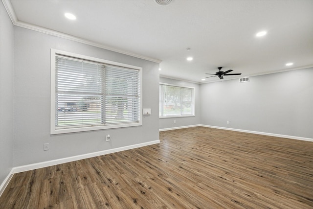 1301 Gulf St, Pasadena, TX 77502 - empty room featuring crown molding, ceiling fan, recessed lighting, wood finished floors, and baseboards