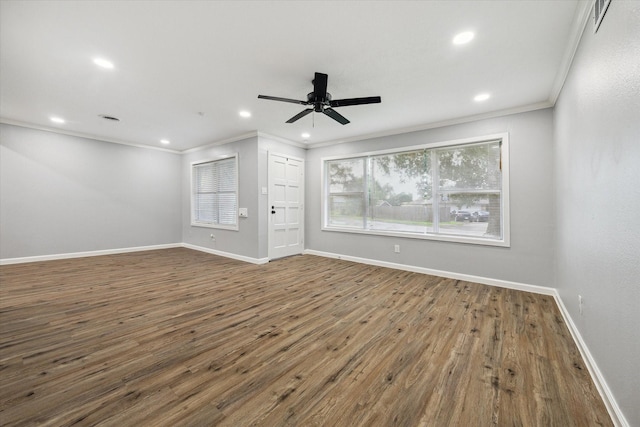 1301 Gulf St, Pasadena, TX 77502 - empty room with crown molding, wood finished floors, a ceiling fan, recessed lighting, and baseboards