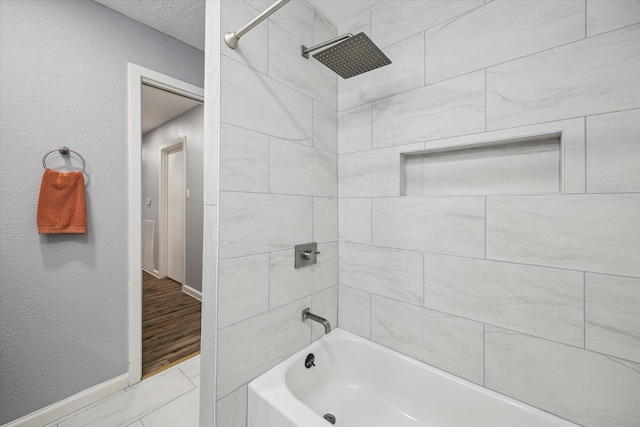 1301 Gulf St, Pasadena, TX 77502 - bathroom with tub / shower combination and baseboards