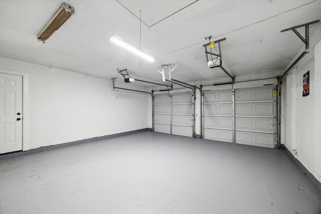 1301 Gulf St, Pasadena, TX 77502 - garage featuring a garage door opener
