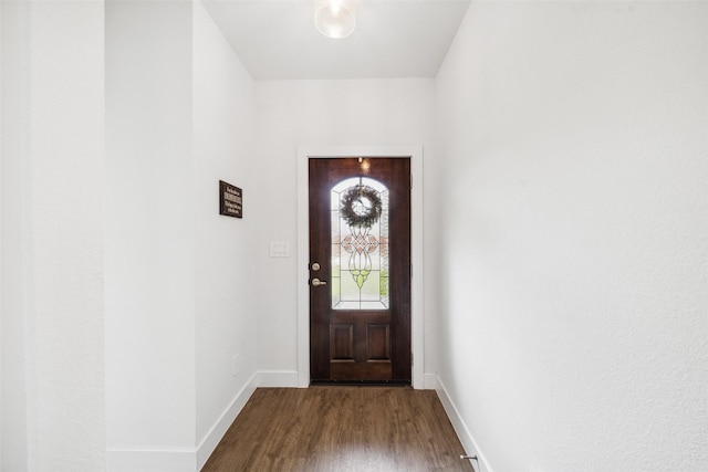 6006 Hazel Place Dr, Conroe, TX 77303 - doorway with dark wood-style floors and baseboards