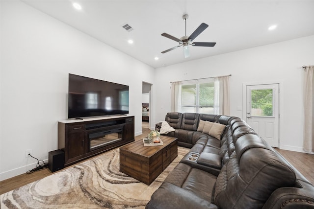 6006 Hazel Place Dr, Conroe, TX 77303 - living area featuring light wood-style flooring, a ceiling fan, baseboards, and recessed lighting