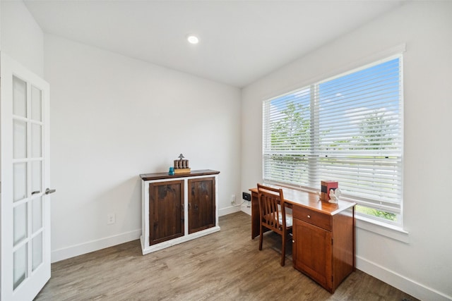 6006 Hazel Place Dr, Conroe, TX 77303 - office area with light wood-style floors, baseboards, healthy amount of natural light, and recessed lighting
