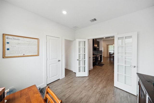 6006 Hazel Place Dr, Conroe, TX 77303 - office area featuring french doors, light wood-type flooring, and recessed lighting