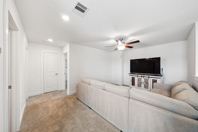 6006 Hazel Place Dr, Conroe, TX 77303 - living area with light colored carpet, ceiling fan, recessed lighting, and baseboards