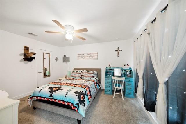 6006 Hazel Place Dr, Conroe, TX 77303 - carpeted bedroom featuring a ceiling fan and baseboards