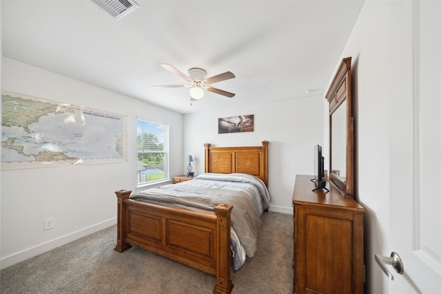6006 Hazel Place Dr, Conroe, TX 77303 - bedroom with light carpet, baseboards, and ceiling fan