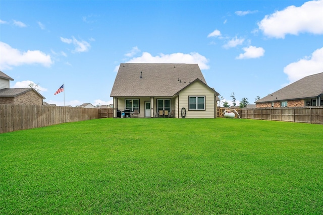 6006 Hazel Place Dr, Conroe, TX 77303 - rear view of house featuring a shingled roof