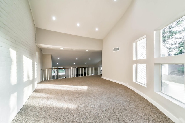 3522 Creekbriar Dr, Houston, TX 77068 - carpeted spare room with high vaulted ceiling, recessed lighting, and baseboards