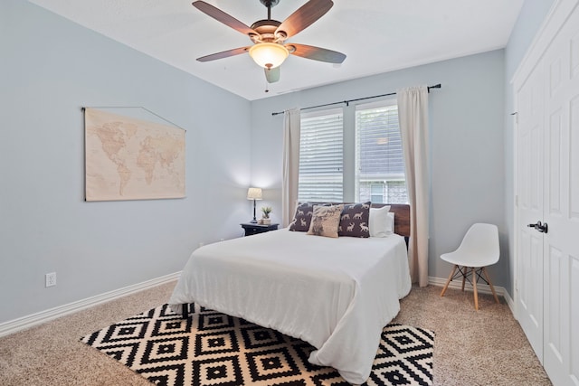 15 Rose Pine Ct, Magnolia, TX 77355 - bedroom with carpet, a closet, baseboards, and a ceiling fan