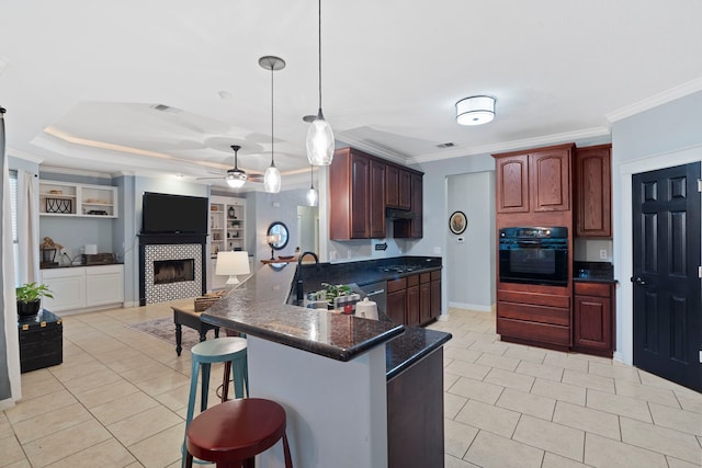 15 Rose Pine Ct, Magnolia, TX 77355 - kitchen featuring oven, ornamental molding, light tile patterned floors, a peninsula, and a kitchen breakfast bar